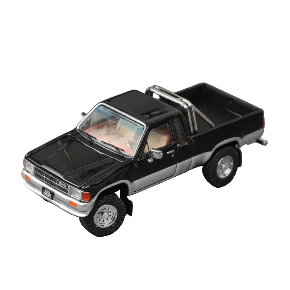 Premium scale diecast model car – *PRE-ORDER* Toyota Hilux Two-Tone (Black & Silver), 1:64 Scale Collectible