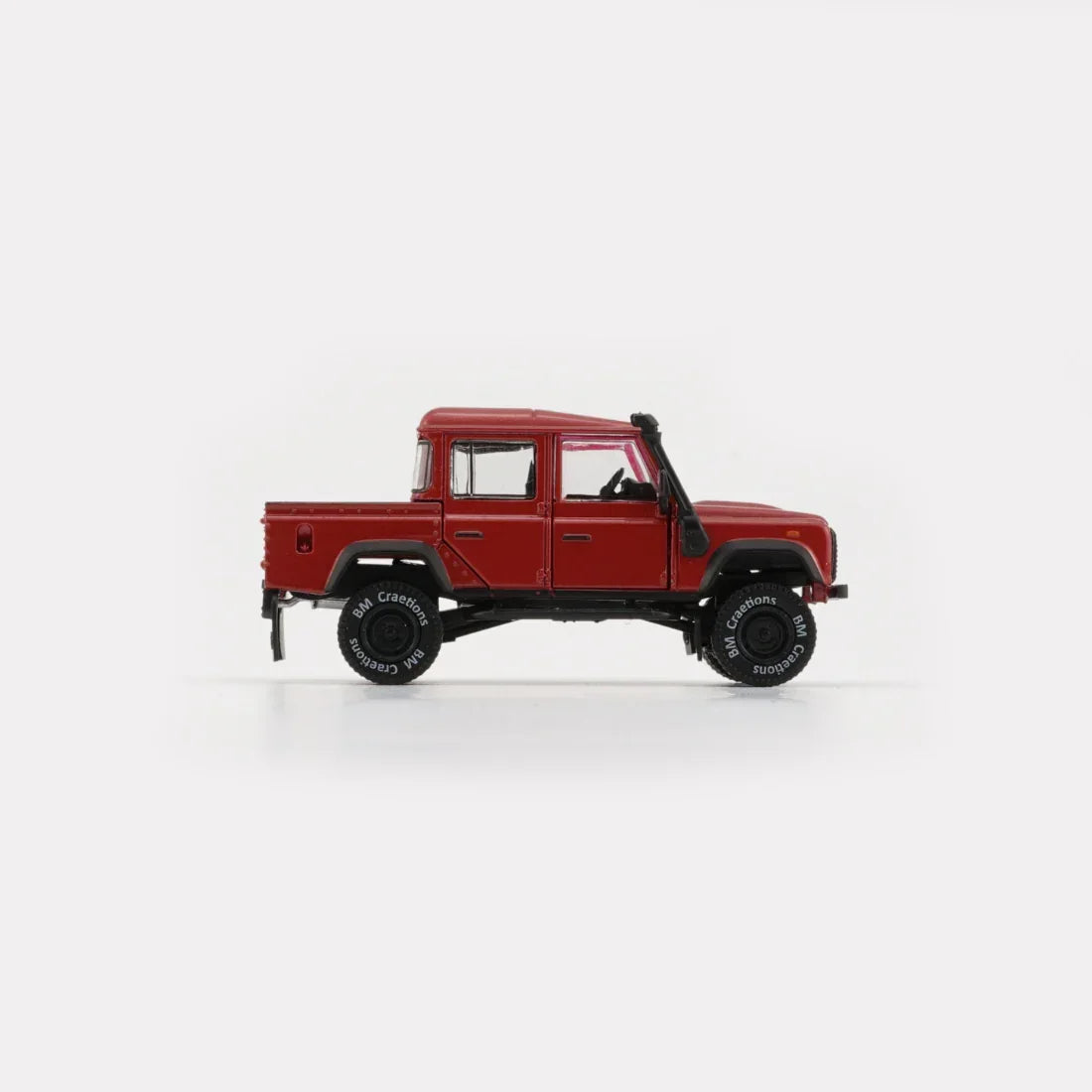 Premium scale diecast model car – Land Rover 2016 Defender 110 Pick Up, 1:64 Scale (Orange) Collectible