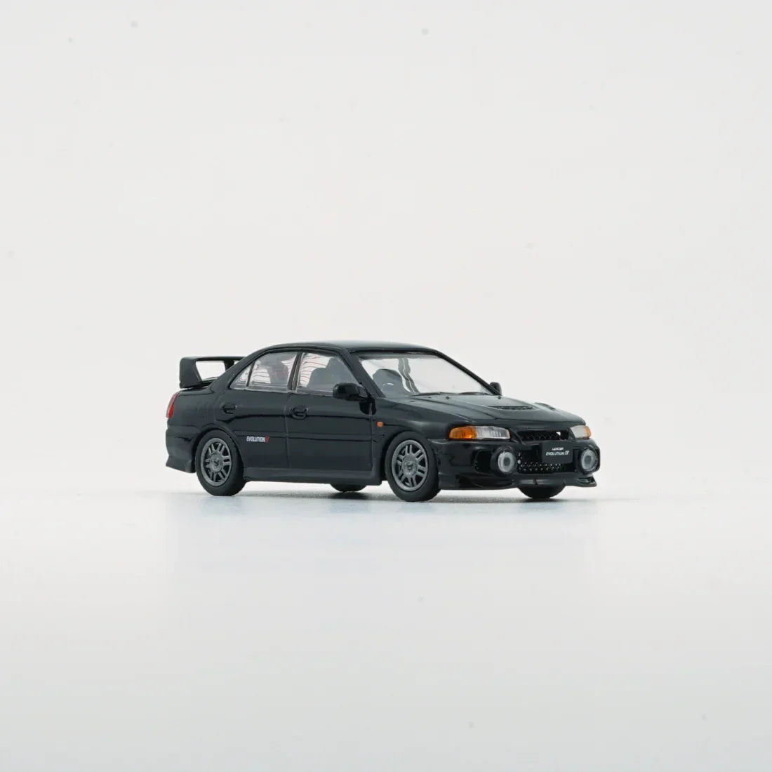 Premium scale diecast model car – Mitsubishi Lancer EVO IV, 1:64 Scale (Black) Collectible