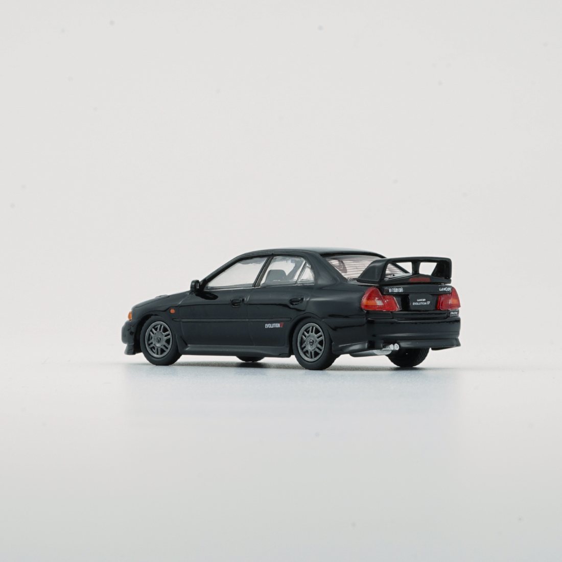 Mitsubishi Lancer EVO IV, 1:64 Scale (Black)