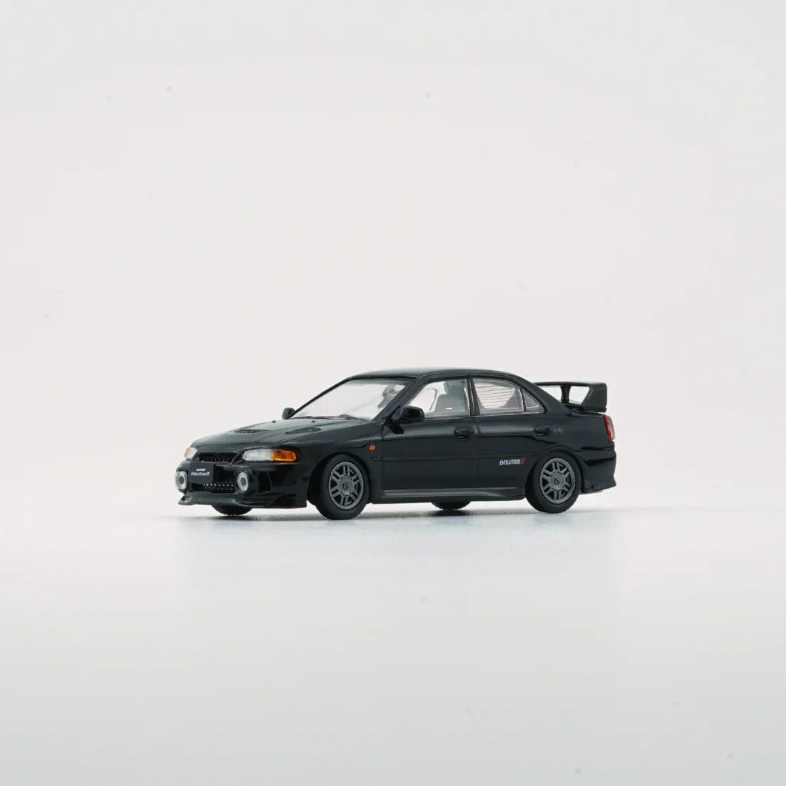 Premium scale diecast model car – Mitsubishi Lancer EVO IV, 1:64 Scale (Black) Collectible