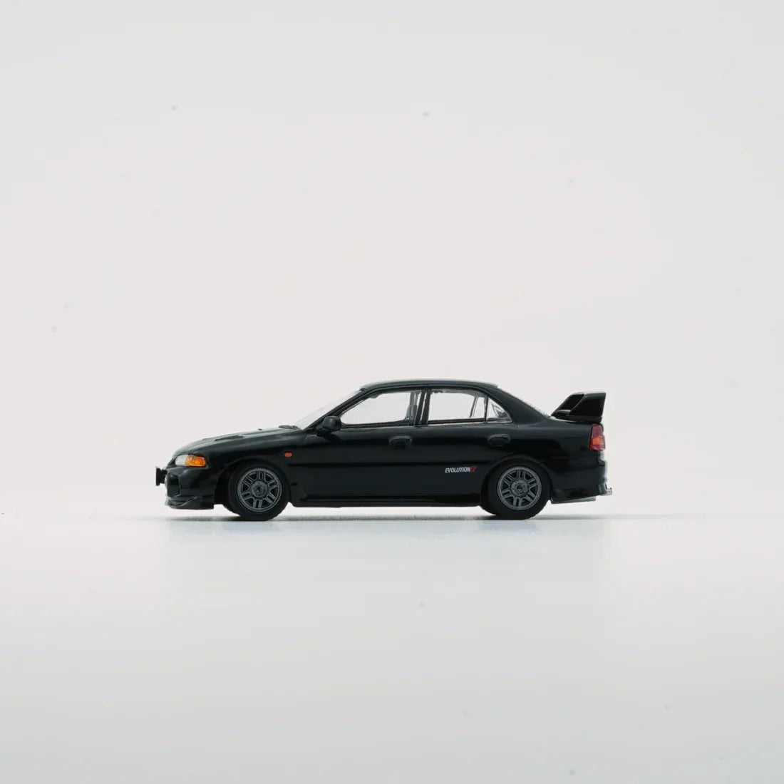 Premium scale diecast model car – Mitsubishi Lancer EVO IV, 1:64 Scale (Black) Collectible