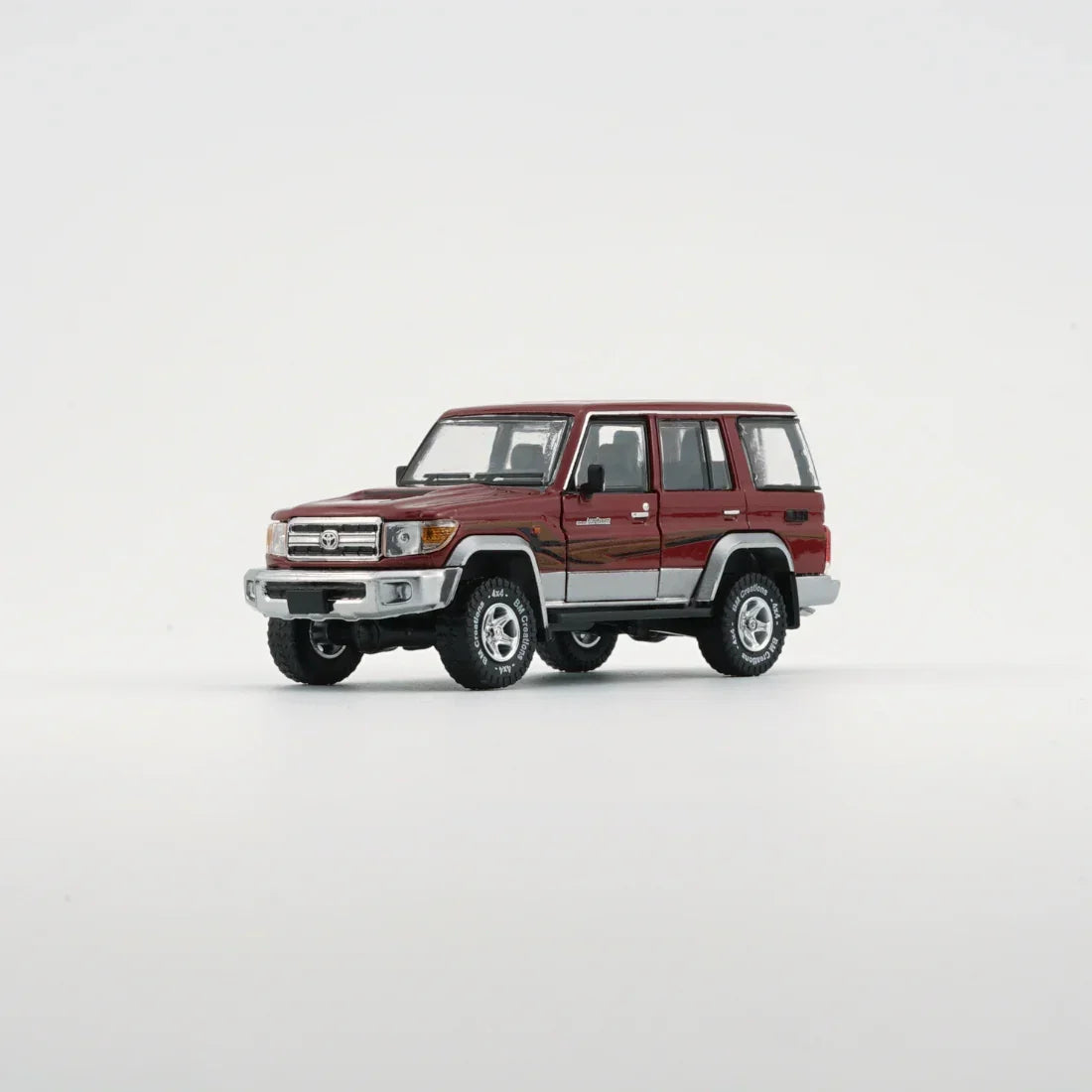 Premium scale diecast model car – Toyota Land Cruiser LC76, 1:64 Scale (Dark Red) Collectible