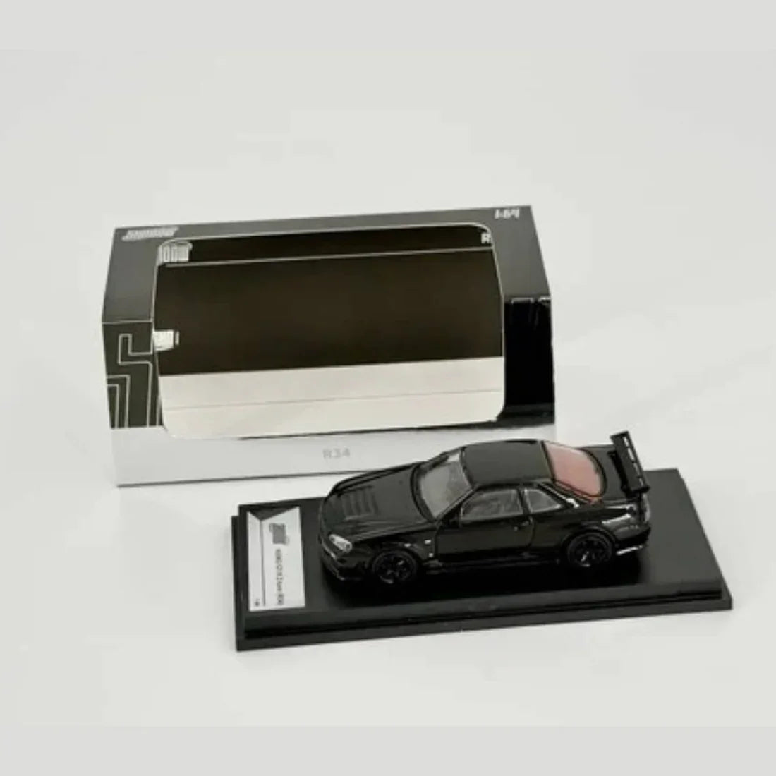 Premium scale diecast model car – *PRE-ORDER* Nismo GT-R (R34) Z-Tune, 1:64 Scale (Black) Collectible