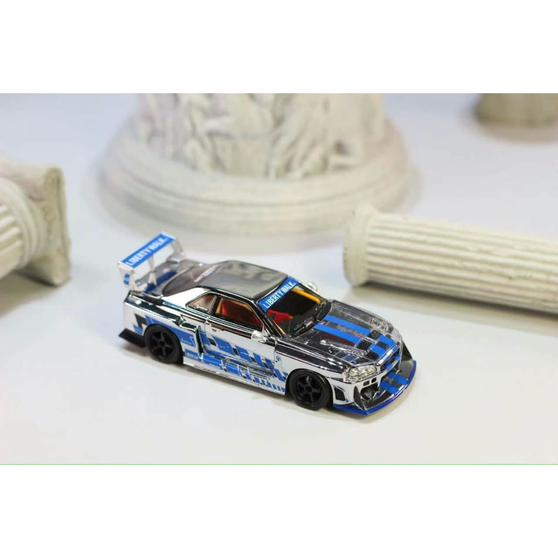 *PRE-ORDER* Nissan Skyline R34,ER34 Super Silhouette (Open-Hood, Visible Engine) Chrome Silver-Blue, 1:64 Scale