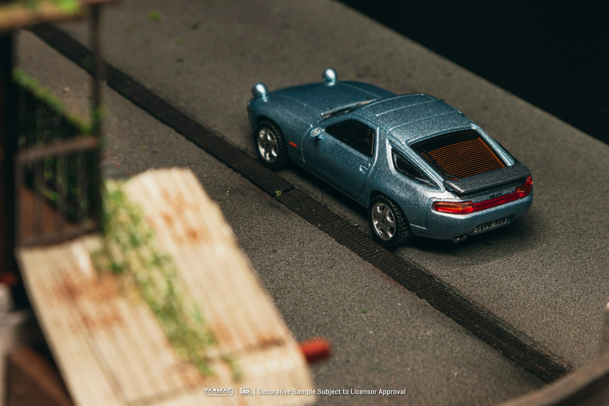 Premium scale diecast model car – *PRE-ORDER* X iXO Models Porsche 928 GTS Chance of Chase Car with Closed Head-Light, 1:64 Scale (Blue Metallic) Collectible