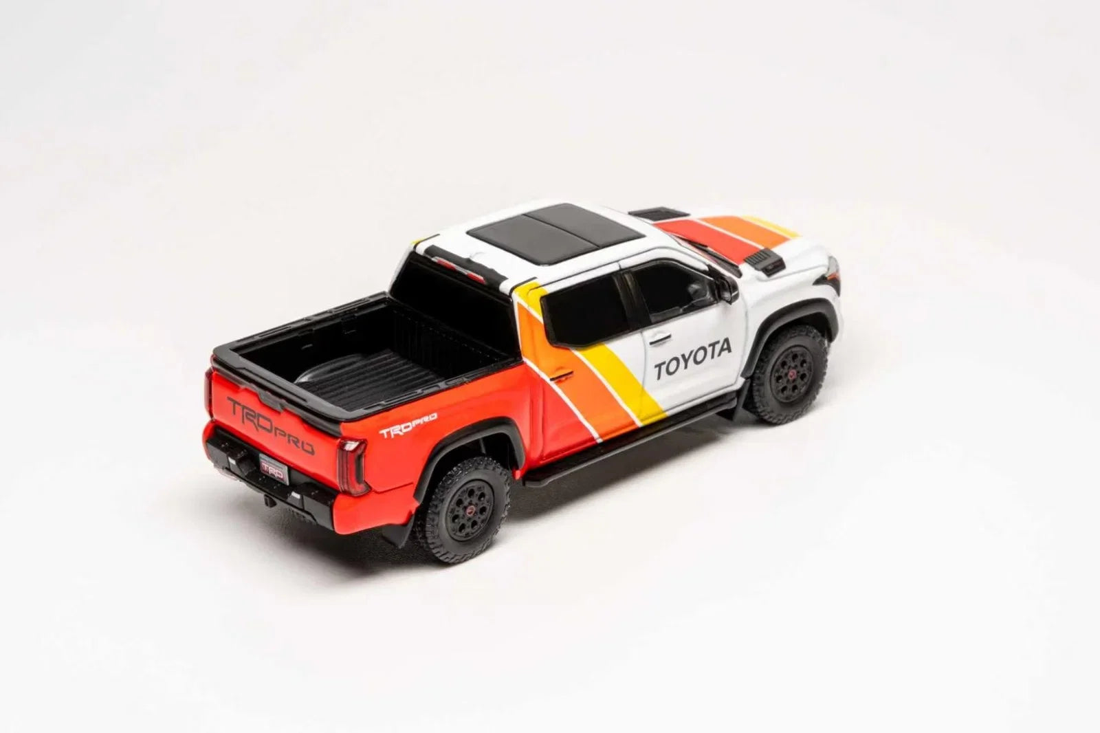 Premium scale diecast model car – *PRE-ORDER* Toyota Tundra TRD PRO (TRD Heritage Livery), 1:64 Scale (White) Collectible