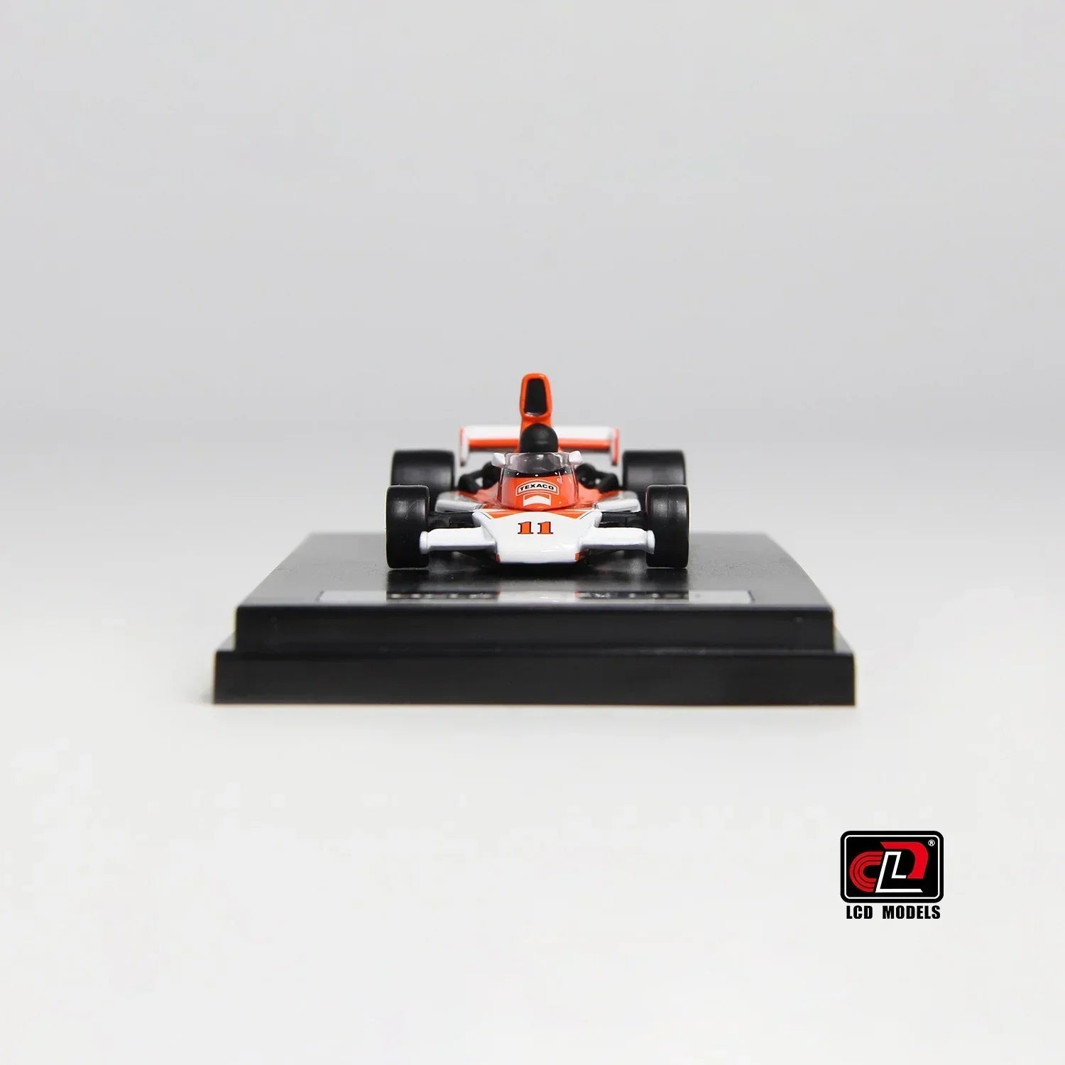Premium scale diecast model car – McLaren M23, 1:64 Scale (Orange with White) Collectible
