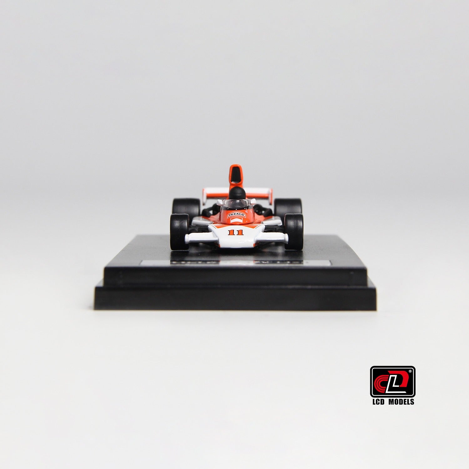 Premium scale diecast model car – McLaren M23, 1:64 Scale (Orange with White) Collectible