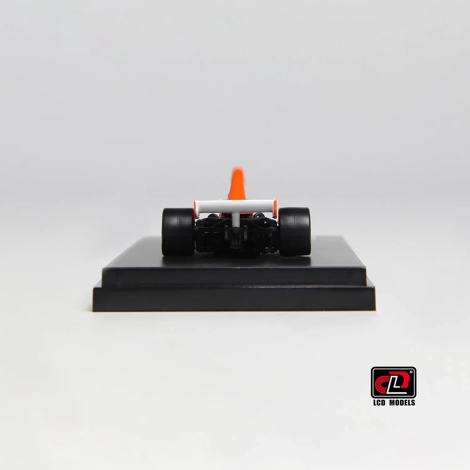 Premium scale diecast model car – McLaren M23, 1:64 Scale (Orange with White) Collectible