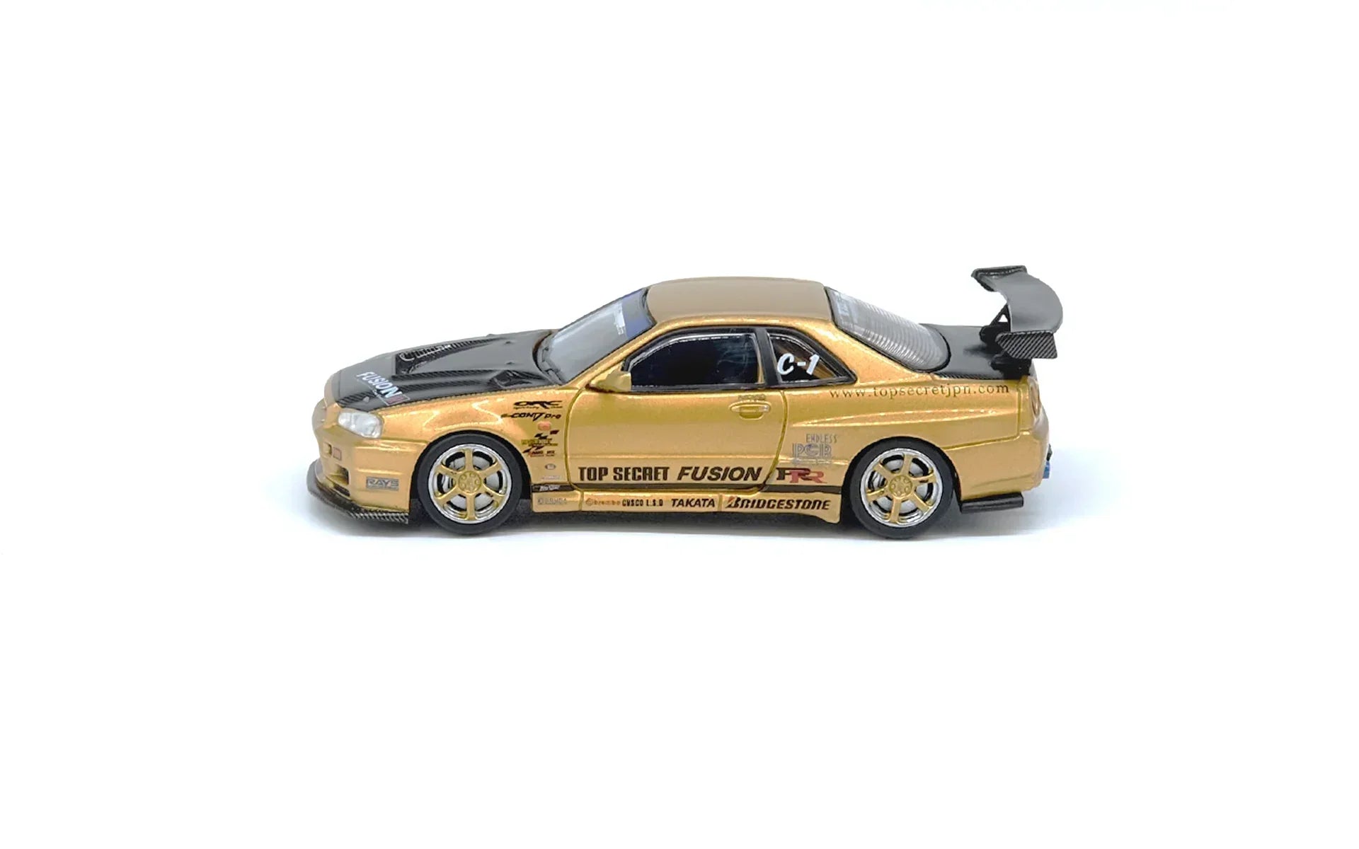 Premium scale diecast model car – Top Secret R34 GT-R, 1:64 Scale (Gold) Collectible