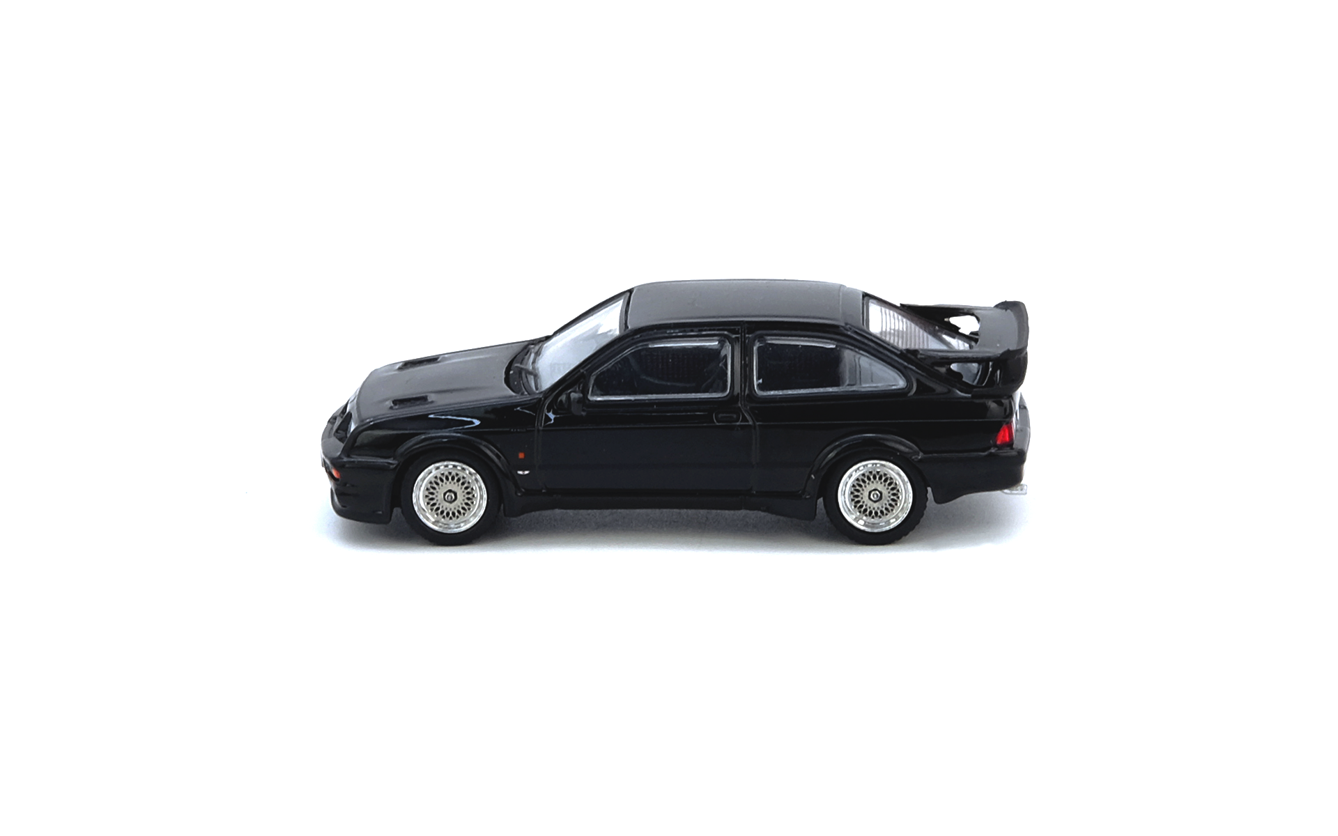Premium scale diecast model car – Ford Sierra RS500 Cosworth, 1:64 Scale (Black) Collectible