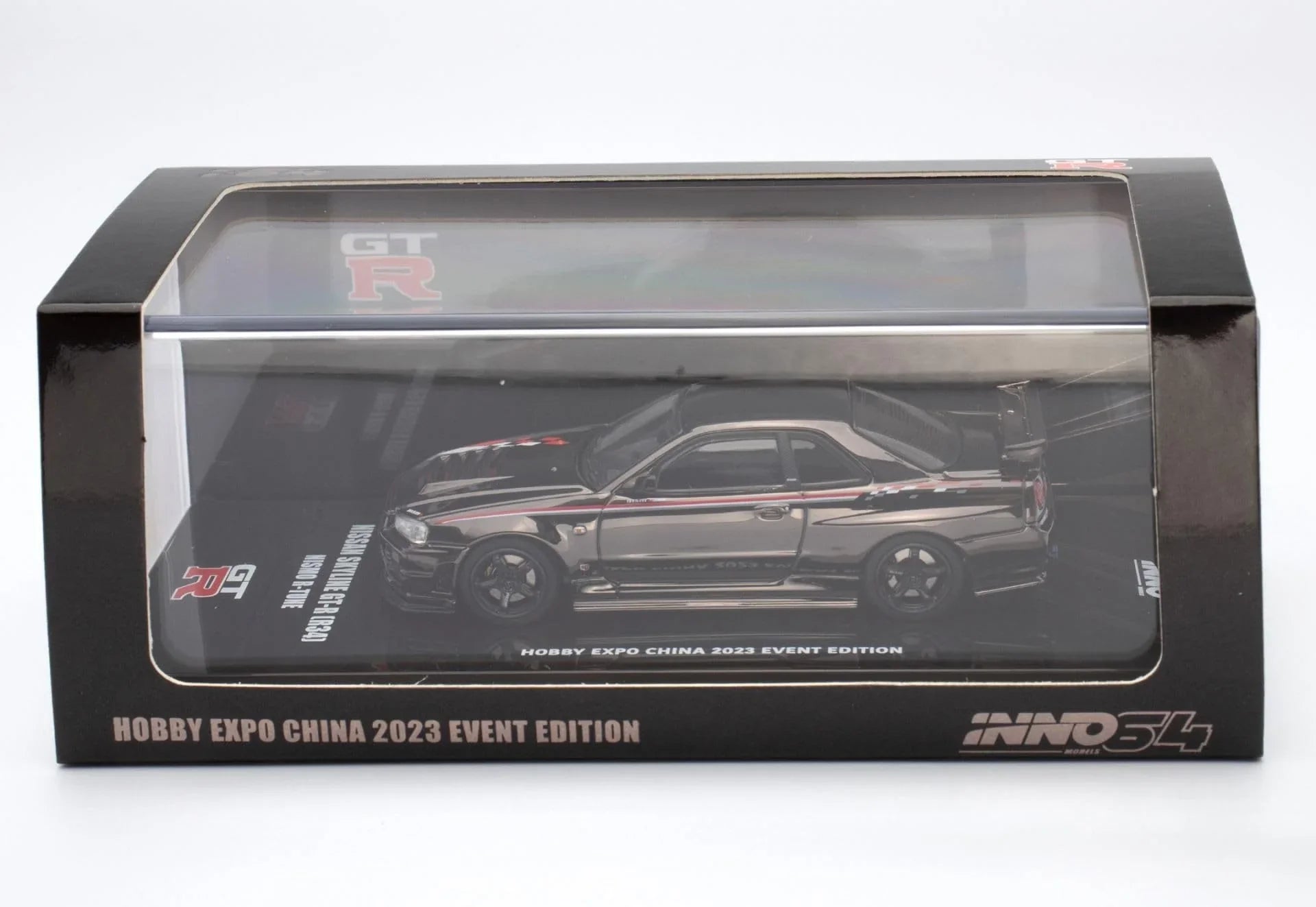 Premium scale diecast model car – *PRE-ORDER* Nissan Skyline GT-R (R34) Nismo R-Tune Black Chrome Hobby Expo China 2023 Event Edition,1:64 Scale Collectible
