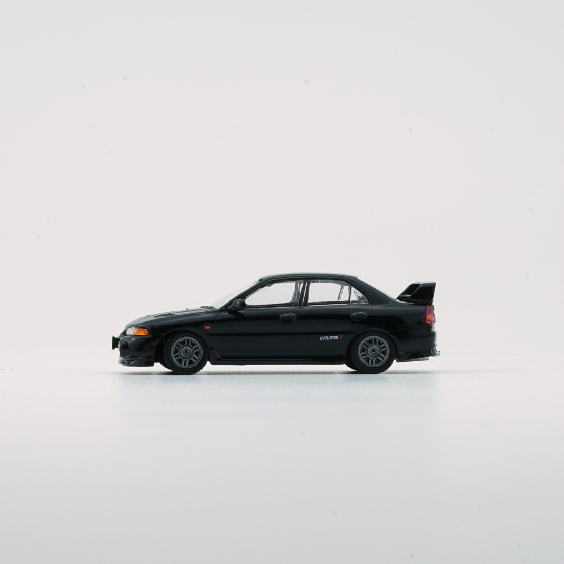Mitsubishi Lancer EVO IV, 1:64 Scale (Black)