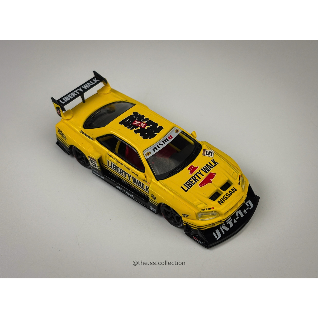 Nissan Skyline ER34 LBWK, 1:64 Scale (Yellow)