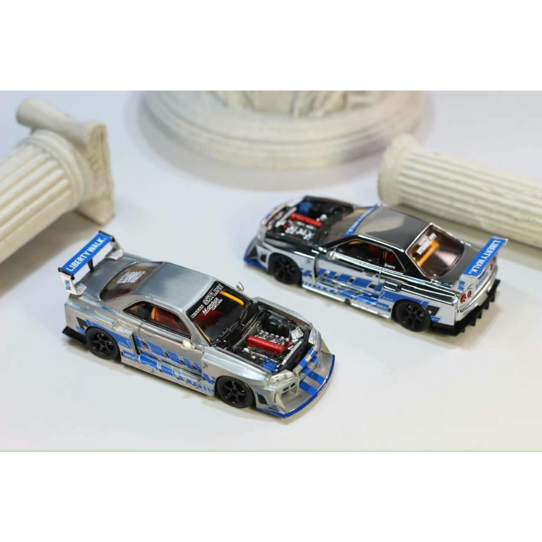 *PRE-ORDER* Nissan Skyline R34，ER34 Super Silhouette (Open-Hood, Visible Engine) Raw Silver-Blue, 1:64 Scale