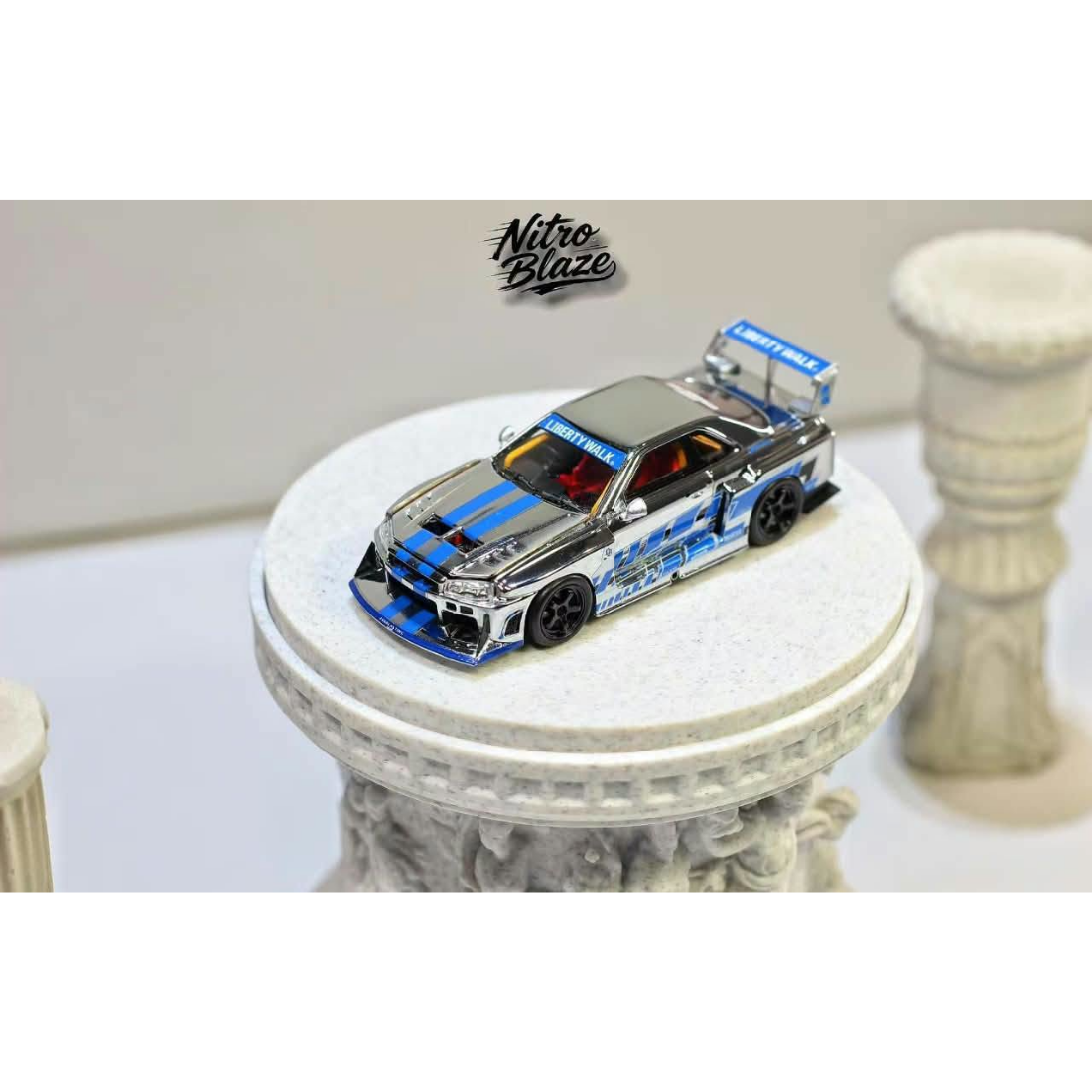 *PRE-ORDER* Nissan Skyline R34，ER34 Super Silhouette (Open-Hood, Visible Engine) Chrome Silver-Blue, 1:64 Scale