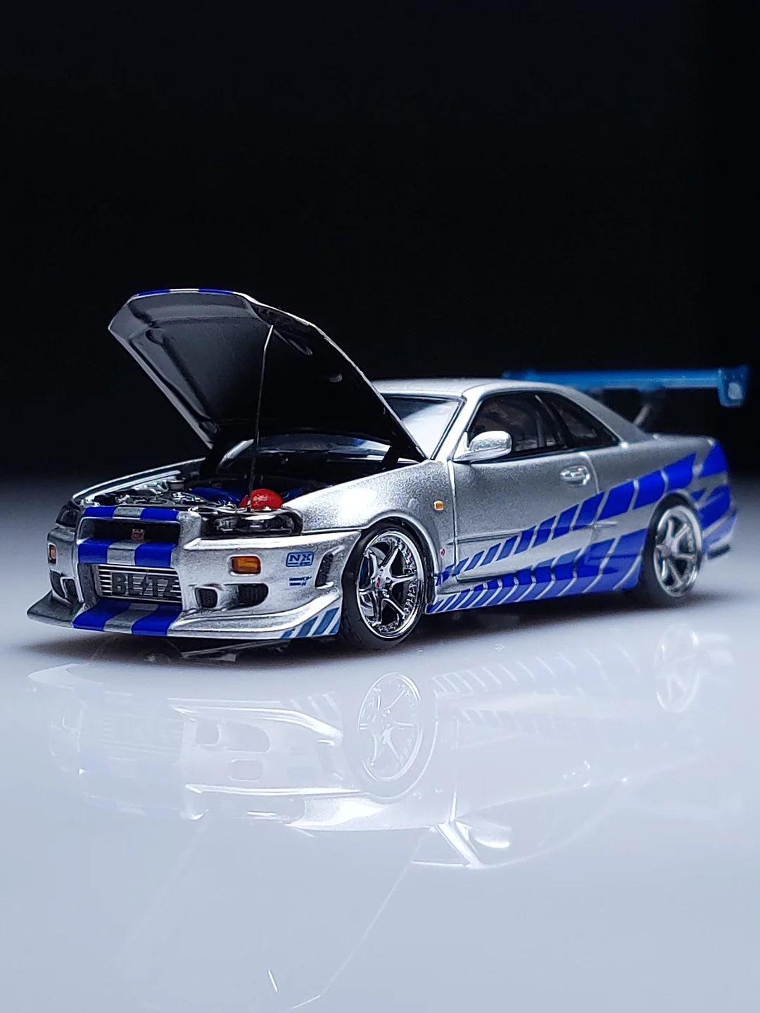 Nissan GTR R34 (Limited to 999pcs) Silver with Blue Lines, 1:64 Scale