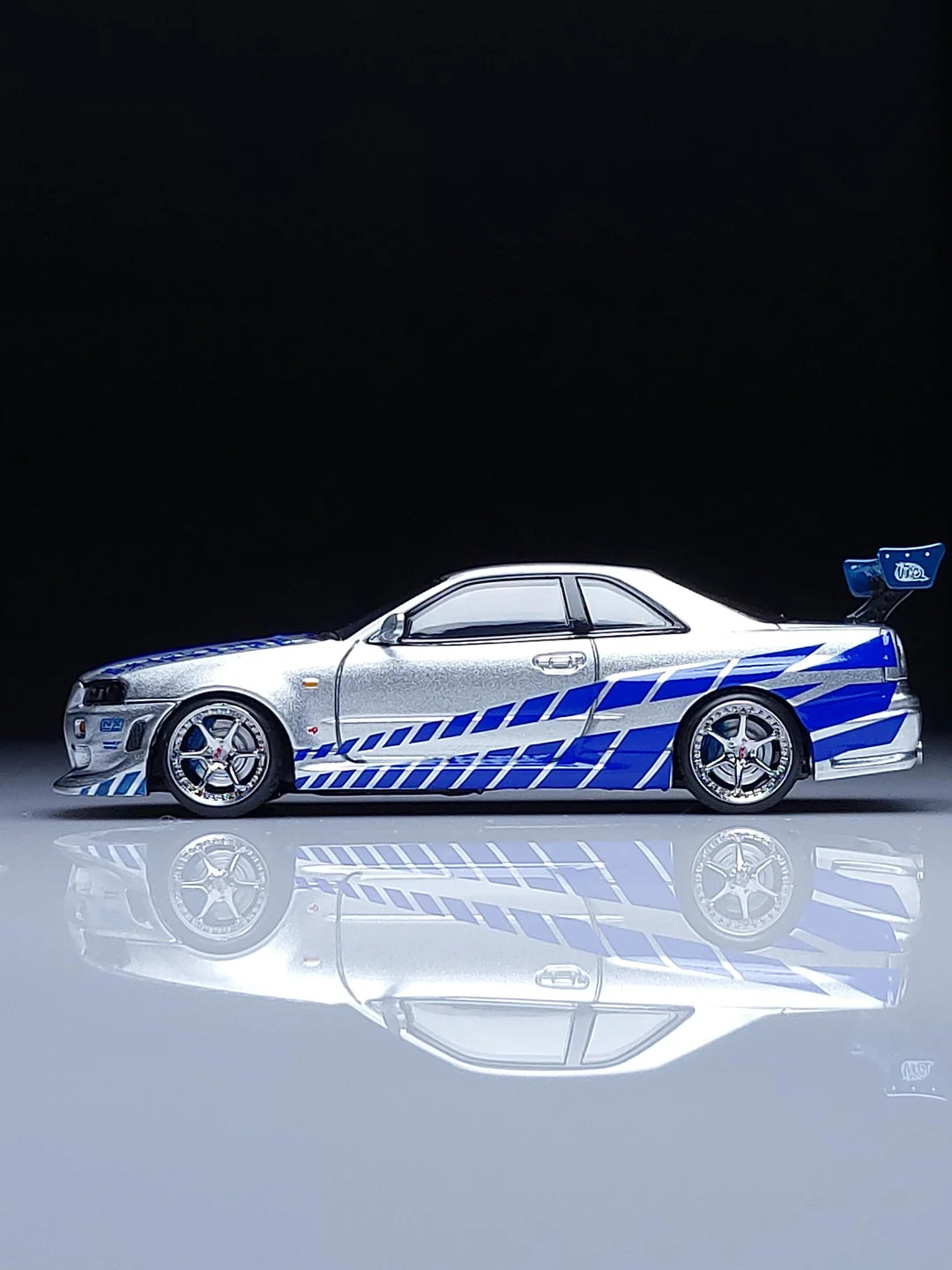 Nissan GTR R34 (Limited to 999pcs) Silver with Blue Lines, 1:64 Scale