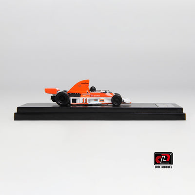 Premium scale diecast model car  – McLaren M23, 1:64 Scale (Orange with White) Collectible