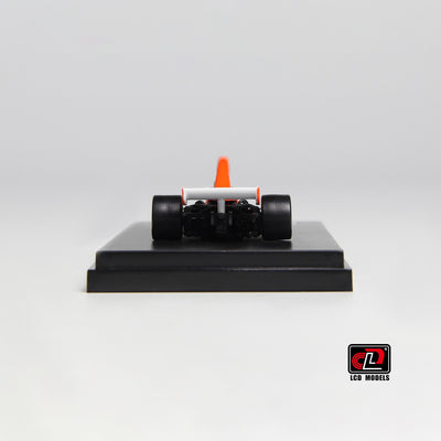 Premium scale diecast model car  – McLaren M23, 1:64 Scale (Orange with White) Collectible
